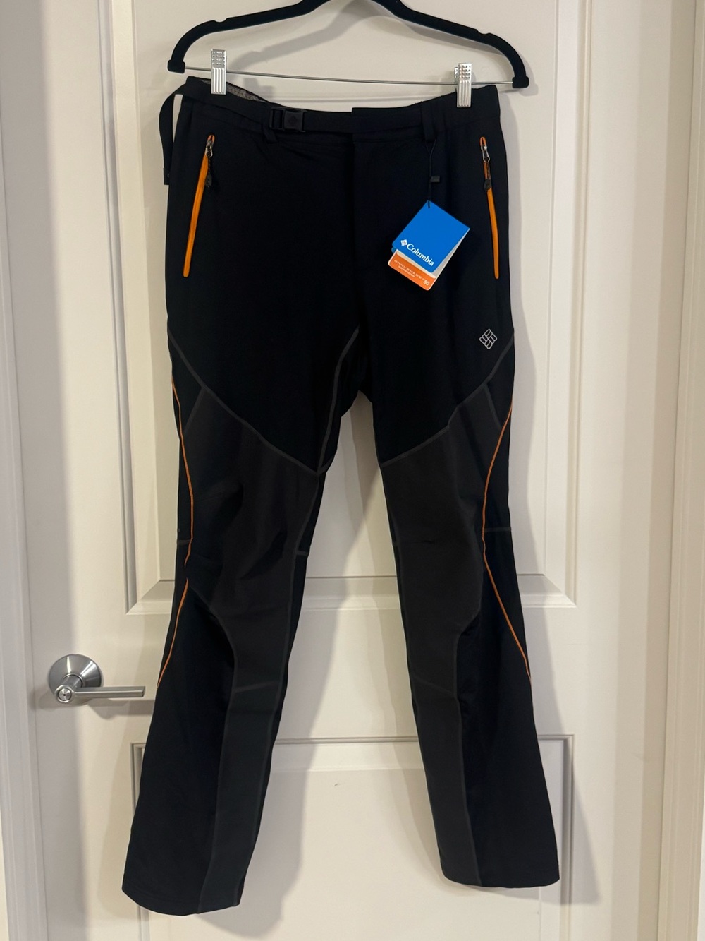 Columbia woman’s Black Softshell Pants with Orange Accents